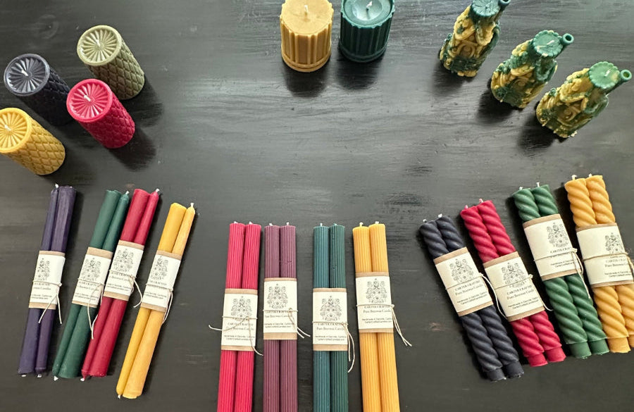 Clean Luxury Beeswax Candles in Pink, Purple Green and Natural on rustic table