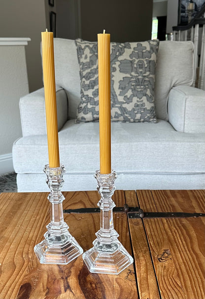Ribbed Taper Dinner candles in natural beeswax on a rustic wooden table